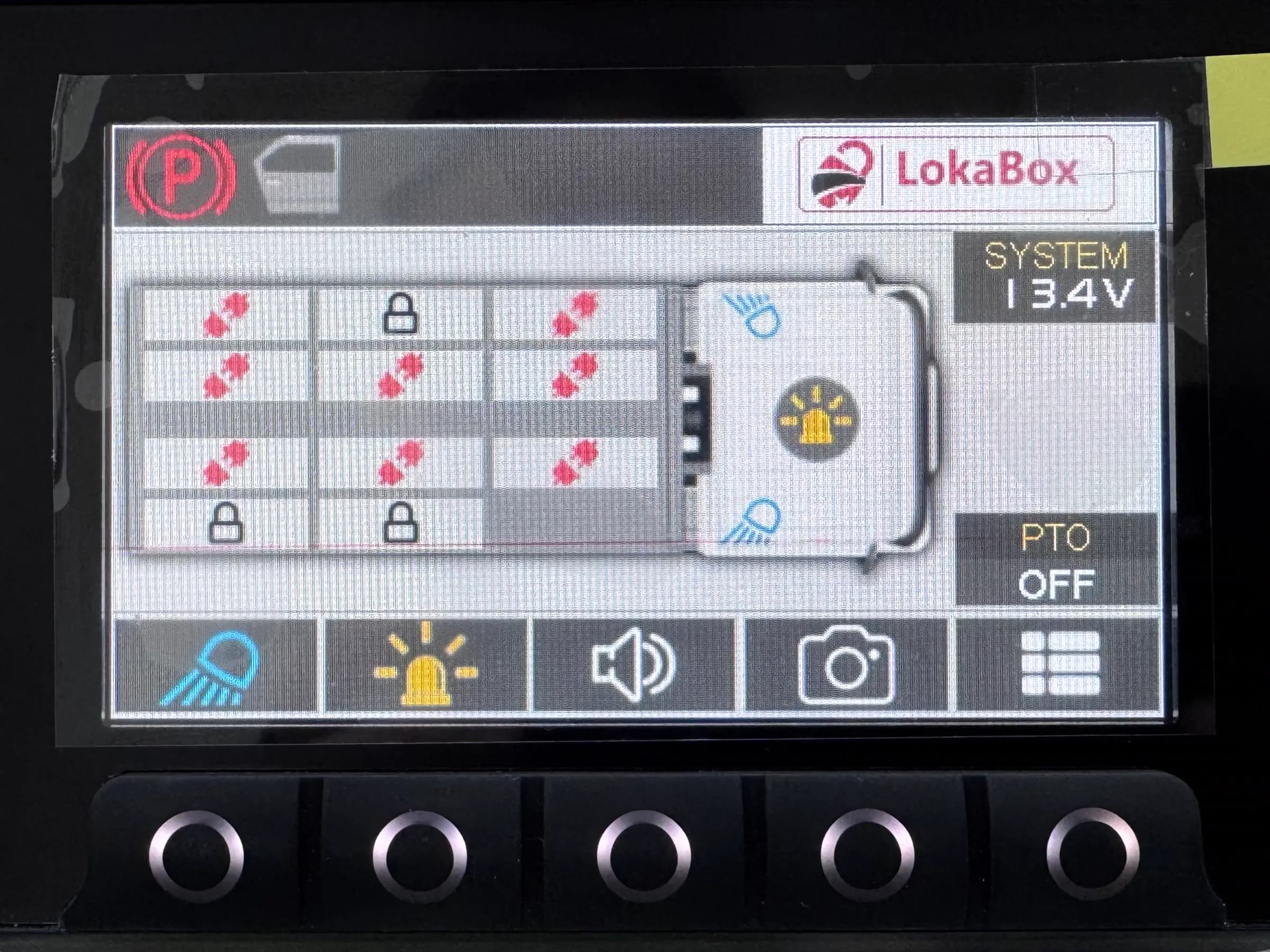 LokaBox in-cab monitor showing the lock status of each compartment, a system voltage of 13.4 volts and PTO status